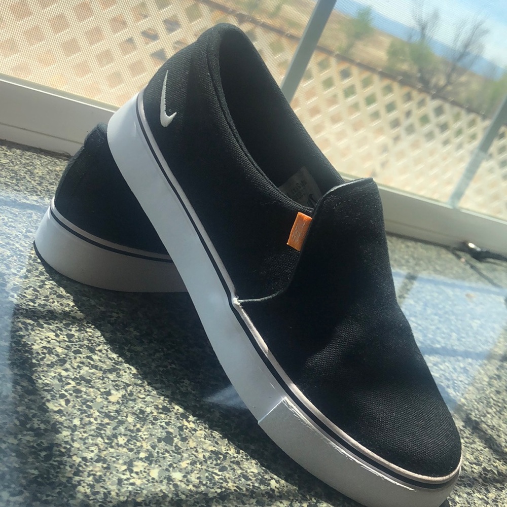 NEW BLACK AND WHITE NIKE COURT ROYAL SLIP-ONS!!!